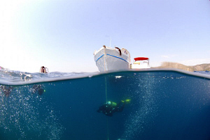 descending at a small island near Kosara by Andy Kutsch 